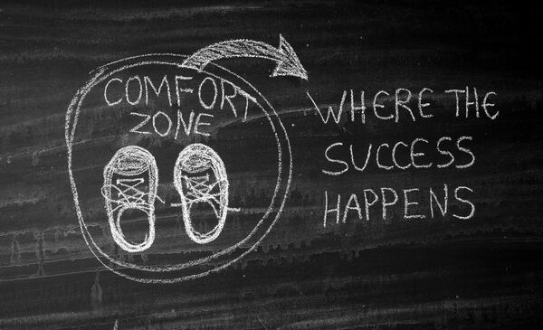Zeichnung: Kreis  “Comfort Zone” mit Pfeil außerhalb des Kreises zu “Where the success happens”